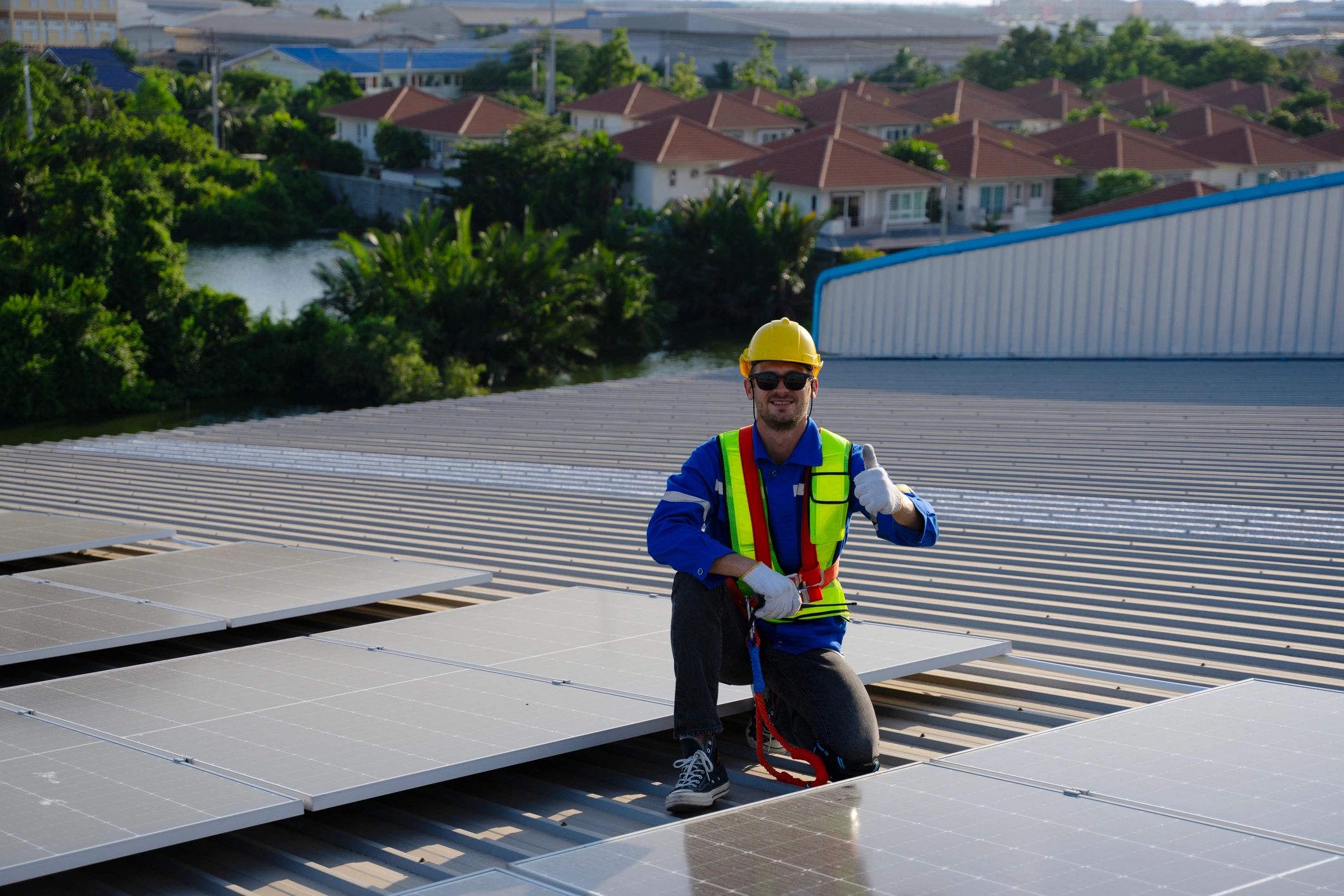 Technicians maintaining electrical systems on a commercial site